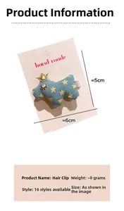 Détail d'une pince à cheveux animal à pois bleus avec couronne dorée, taille 5x6cm