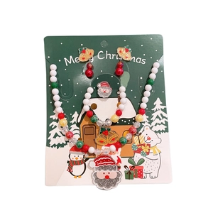 Set di gioielli natalizi per bambini con perline, ciondolo Babbo Natale e campanello