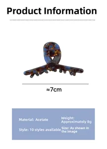 Detail view of tortoiseshell acetate hair claw clip showing 7cm size and 8g weight specs