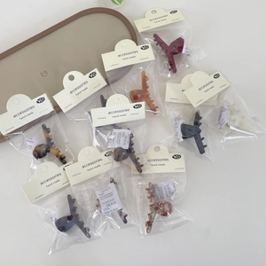 Set of classic tortoiseshell acetate hair claw clips for women in various retro colors