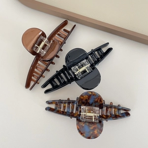 Trois pinces à cheveux en acétate haut de gamme en marron, noir et motif écaille bleu