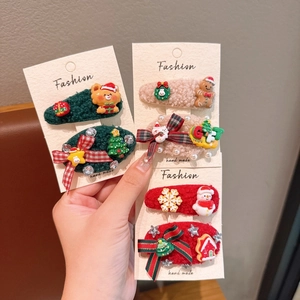 Détails des barrettes de Noël avec de mignons motifs de Père Noël et de bonhomme de neige