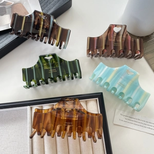 Large striped acetate hair claw clips with heart cutout and glossy finish set of five