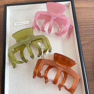 Set di tre mollette per capelli in resina rosa, verde oliva e ambra