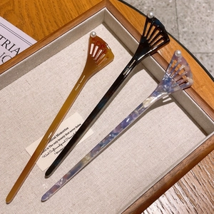 Three-piece acetate fish tail hair pins with pearls in amber, black and marble purple