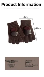 Detail view of brown knit gloves with mushroom decor, 14cm length and 44g weight specs