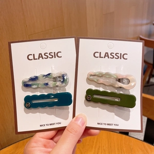 Lot de barrettes à cheveux ondulées de 6cm colorées aux finitions marbre et laque