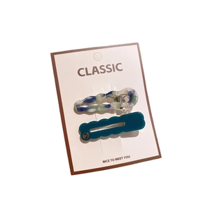 Lot de deux barrettes à cheveux ondulées aux couleurs pastel et texture marbrée