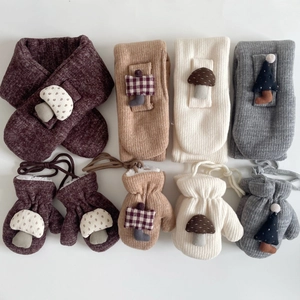 Detail view of 4-color kids winter knitted scarf and fleece-lined mitten sets
