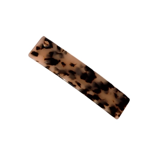 Classic tortoiseshell acetate barrette with a square champagne gemstone accent