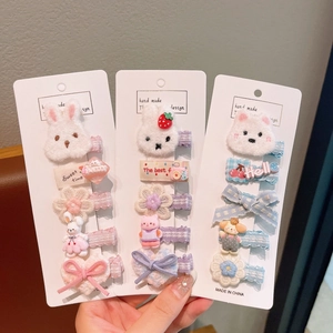 Détail d'un lot de 5 barrettes mignonnes pour filles avec lapins et nœuds en peluche