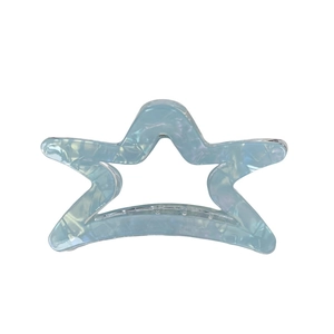 Elegant hollow star hair claw clip in light blue acetate with a pearlescent finish