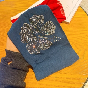 Knitted wide headbands in navy and red featuring hibiscus rhinestone floral patterns