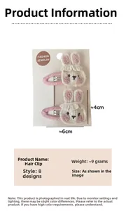 Détail de barrettes lapin en tricot rose et blanc avec perles et nœuds, taille 4x6cm