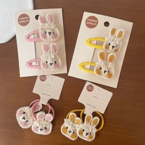 Détails du lot de barrettes et élastiques lapin en tricot rose et jaune pour fille