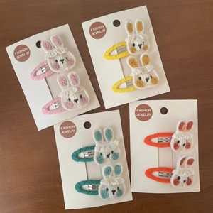 Lot de barrettes à cheveux lapin au crochet pour filles en quatre couleurs sur bois