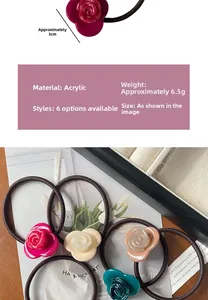 Detailed close-up of rose-shaped acetate hair ties in marble texture and four colors