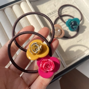 Elegant rose acetate hair ties set in colorful floral designs with high elasticity bands