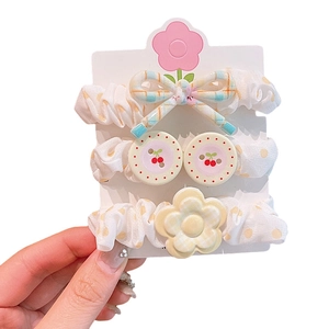 Lot de trois chouchous pour filles avec décors cerise, nœud et motifs floraux