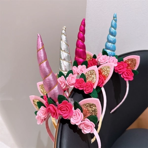 Glitter unicorn headbands for kids with fabric flowers for birthday and holiday parties