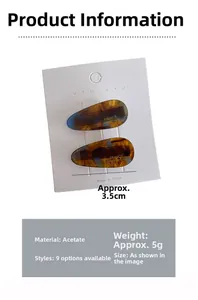 Macro detail of tortoiseshell acetate hair clips with France Handmade text on card