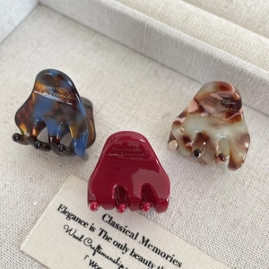 Lot de trois pinces à cheveux en acétate écaille de tortue, rouge et crème pour coiffure