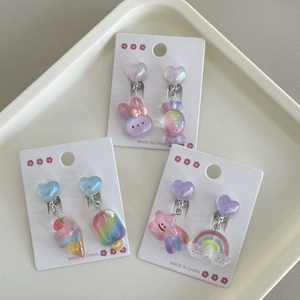 Three pairs of rainbow flower heart clip-on earrings for girls with sweet resin pendants