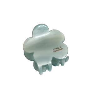 Light blue flower acetate hair claw clip with France Handmade text in a clean design