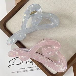 Elegant crystal heart hair claw clips in blue and pink with pearlescent finish