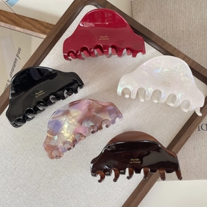 French vintage acetate shark hair claws in five marble and tortoise patterns