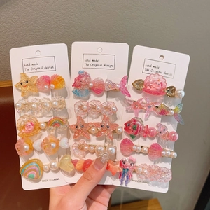 Détails de pinces à cheveux océan mignonnes en résine pour enfants sur carte de présentation