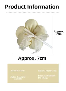 Détail de l'accessoire cheveux crème avec nœud en dentelle et dimensions de 7cm