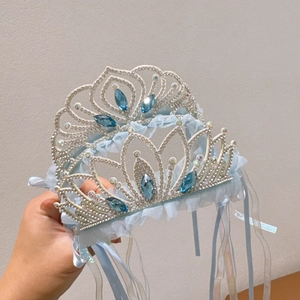 Sparkling silver princess crown headband with blue rhinestones and flowing ribbons