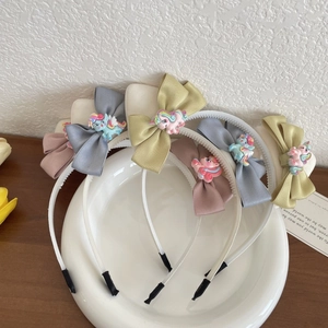 Set di cerchietti per capelli con orecchie di gatto, fiocchi e ciondoli a forma di unicorno