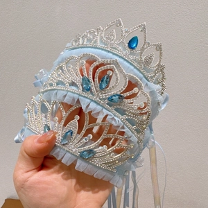 Detailed view of light blue princess crown headbands with sequins and crystal rhinestones