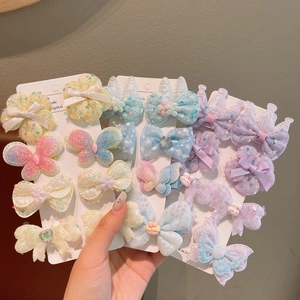 Cute bow and floral hair clips set for little girls in pastel macaron glitter fabrics