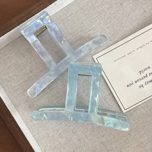 Elegant geometric square hair claw clips in pearlescent white and soft blue colors