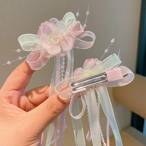 Pink and purple organza butterfly hair clips with floral pearls and flowing tassels