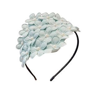 Elegant girls floral headband with light blue flowers and white pearls for little princesses