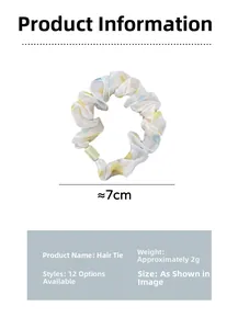 Polka dot fabric scrunchie detail showing 7cm diameter and lightweight 2g material