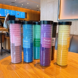 Set of colorful wave-pattern hair ties in clear jars for girls' high-stretch styling