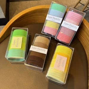 Detail view of 20Pcs candy color hair ties sets in various high elasticity pastel shades