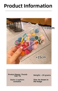 Detail view of colorful elastic hair ties in a daisy-decorated transparent zipper bag