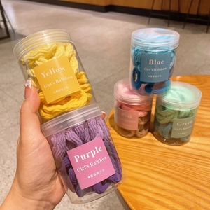 Détails d'élastiques à cheveux macaron haute élasticité en flacons cylindriques clairs