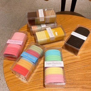 Colorful high-elasticity hair ties set in a transparent box for seamless ponytail styling