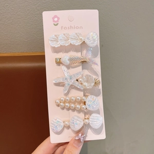 Détails du lot de 5 barrettes à cheveux thème marin avec étoile de mer et coquillages