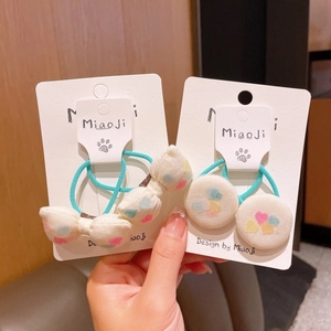 Mint green checkered hair ties set with cotton bows and colorful star patterns for girls