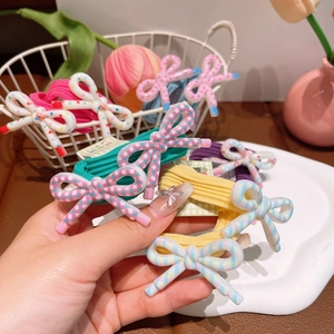 Colorful resin bow hair ties set with polka dots and stripes for kids and women