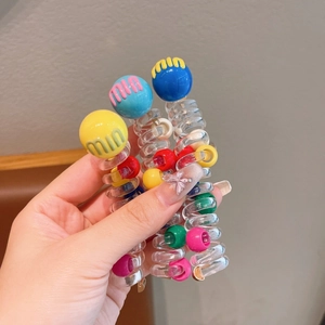 Colorful telephone wire hair ties with vibrant beads and round ball charms for girls