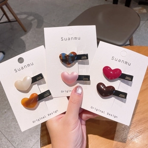 Elegant acetate heart hair clips set in marble and solid colors for women hair styling